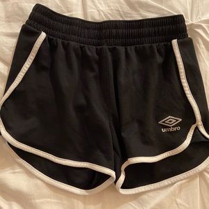 Umbro black and white striped workout shorts.